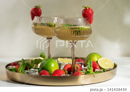 Refreshing strawberry lime mojito cocktails for summer party 141438430