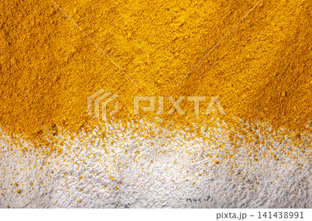 Turmeric powder on the table (Curcuma longa) Turmeric powder on the table (Curcuma longa) 141438991