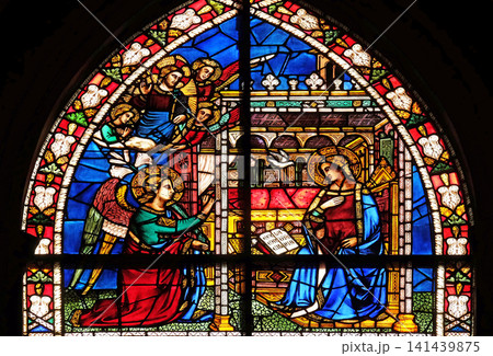 Annunciation to the Virgin Mary stained glass window in Santa Maria Novella Principal Dominican church in Florence, Italy Annunciation to the Virgin Mary stained glass window in Santa Maria Novella Principal Dominican church in Florence, Italy 141439875