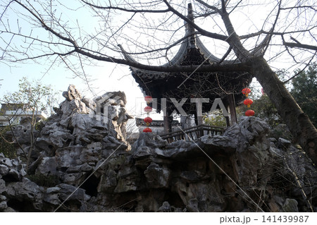 Pagoda in Xitang Ming and Qing Dynasty Residence Wood Carving Exhibition Hall, Xitang town in Zhejiang Province, China Pagoda in Xitang Ming and Qing Dynasty Residence Wood Carving Exhibition Hall, Xitang town in Zhejiang Province, China 141439987