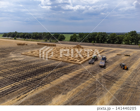 Aerial View of Harvested Field with Hay Bale Maze 141440205