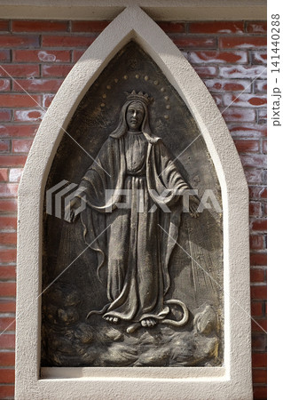 Blessed Virgin Mary, the outer wall of the cathedral of St. Ignatius in Shanghai, China Blessed Virgin Mary, the outer wall of the cathedral of St. Ignatius in Shanghai, China 141440288