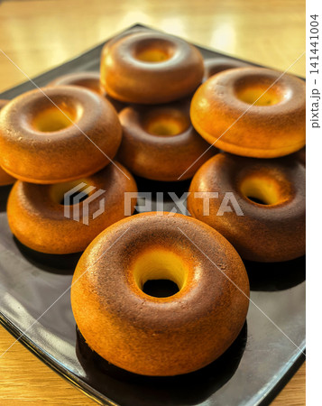 Homemade Low Carb Keto Donuts on Black Plate Homemade Low Carb Keto Donuts on Black Plate 141441004