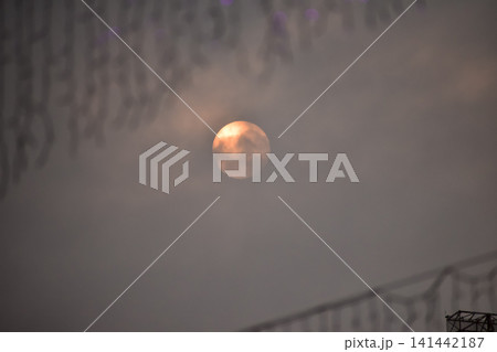 Full moon with dramatic cloudscape. Cloudy overcast sky with moon. Nature scene. Full moon with dramatic cloudscape. Cloudy overcast sky with moon. Nature scene. 141442187