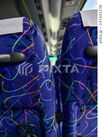Close-up of the interior of a coach. Travel and transportation concept. Close-up of the interior of a coach. Travel and transportation concept. 141442236