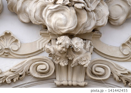 Angels on the portal of Mariahilf church in Graz, Styria, Austria Angels on the portal of Mariahilf church in Graz, Styria, Austria 141442455