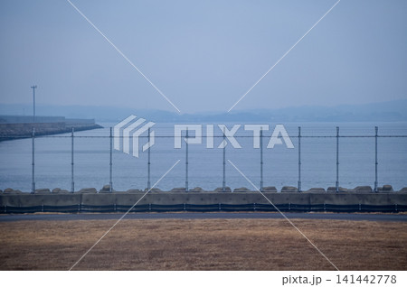The view of Nagoya Airport during taking off. Airport scene of Nagoya, Japan. Travel concept. The view of Nagoya Airport during taking off. Airport scene of Nagoya, Japan. Travel concept. 141442778