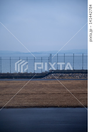 The view of Nagoya Airport during taking off. Airport scene of Nagoya, Japan. Travel concept. The view of Nagoya Airport during taking off. Airport scene of Nagoya, Japan. Travel concept. 141442784