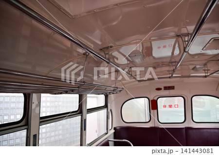 Detail of the interior of a vintage bus. Retro bus. Close-up of the armrest, insides of the bus. Interior of a classic vintage bus Detail of the interior of a vintage bus. Retro bus. Close-up of the armrest, insides of the bus. Interior of a classic vintage bus 141443081