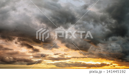 Evening sunset sky with colorful clouds. Panoramic skyscape 141445192