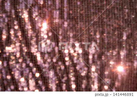 Pink glitter bokeh lights creating abstract sparkling background with soft glowing highlights 141446891