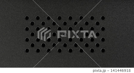 Dark metal surface with hole grill Dark metal surface with hole grill 141446918