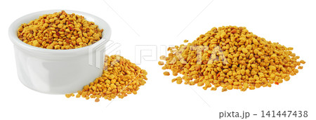 Bee pollen grains in ceramic bowl isolated on white background Bee pollen grains in ceramic bowl isolated on white background 141447438