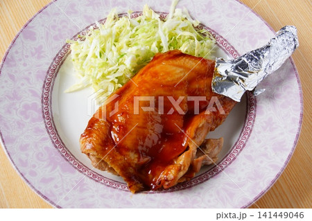 骨付き鶏もも肉の照り焼き 骨付き鶏もも肉の照り焼き 141449046