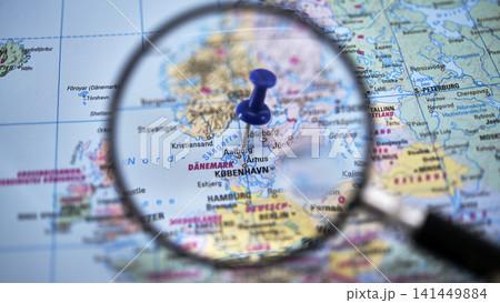 AALBORG highlighted on paper map with magnifying glass 141449884