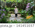 Asian tourist woman visiting Royal Park Rajapruek in Chiang Mai province of Thailand.  141451037