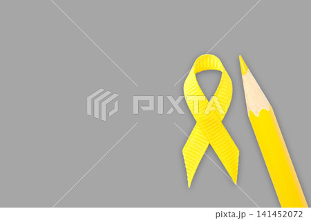Yellow ribbon and yellow pencil represent support and awareness Yellow ribbon and yellow pencil represent support and awareness 141452072