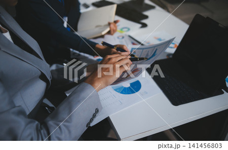 Business Consulting meeting working and brainstorming new business project finance investment concept. Business Consulting meeting working and brainstorming new business project finance investment concept. 141456803