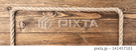 rustic wooden background with rope frame rustic wooden background with rope frame 141457101