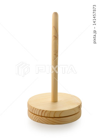 Wooden paper towel holder showcasing rustic charm and functional design in a bright kitchen setting Wooden paper towel holder showcasing rustic charm and functional design in a bright kitchen setting 141457873