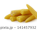 Golden mini corn delights stacked beautifully on a clean surface ready for cooking or snacking, showcasing their vibrant color and fresh texture 141457932