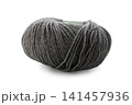 Intricate textures of soft gray yarn waiting to be transformed into a cozy creation 141457936