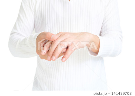 The man touches the wrist and thumb. He squeezes the knuckle of the thumb and wrist. He suffered a tendon injury, arthritis in his wrist, and de quervain's disease. The man touches the wrist and thumb. He squeezes the knuckle of the thumb and wrist. He suffered a tendon injury, arthritis in his wrist, and de quervain's disease. 141459708