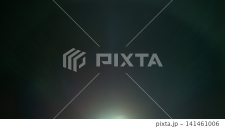 Abstract cinematic lens flare overlay with soft blue light rays, subtle optical glow and dark background. Premium VFX element for compositing, film editing, titles and motion graphics. 141461006
