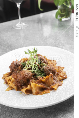 Prupetti sicilan Polpette In Sugo meatballs in ragu tomato sauce with Pappardelle pasta in Sicily restaurant Prupetti sicilan Polpette In Sugo meatballs in ragu tomato sauce with Pappardelle pasta in Sicily restaurant 141461549