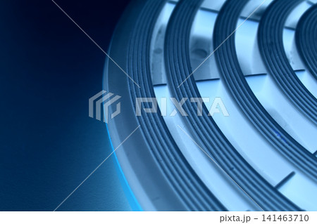 Round platform with concentric pattern illuminated with blue light with copy space Round platform with concentric pattern illuminated with blue light with copy space 141463710