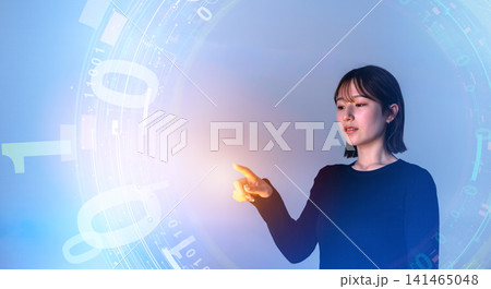 デジタル空間で指を差す若い女性 141465048