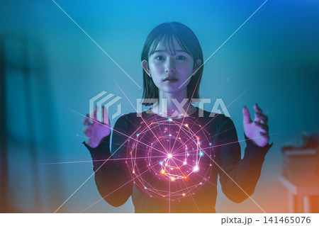 光る球体を操る女性、ネットワークと情報 光る球体を操る女性、ネットワークと情報 141465076