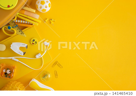 Yellow school supplies and stationery flat lay concept 141465410