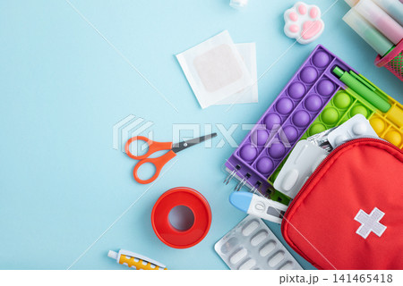 Children's first aid kit with medical supplies and pop it fidget toy 141465418