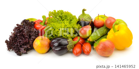 Vibrant Mix of Fresh Organic Vegetables and Ripe Fruits Isolated on White. Healthy Eating Vegan Groceries Group with Space. Vibrant Mix of Fresh Organic Vegetables and Ripe Fruits Isolated on White. Healthy Eating Vegan Groceries Group with Space. 141465952