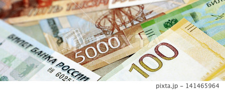 Russian ruble paper banknotes pile on table. Russia RUB currency money bills in big amount 141465964