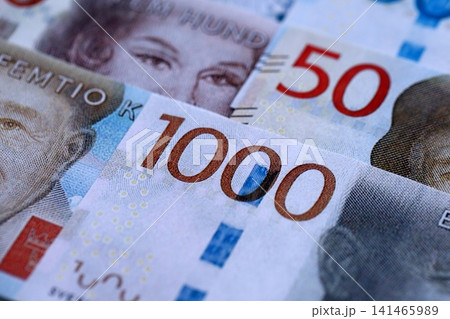 Swedish krona paper banknotes pile on table. Sweden SEK currency money bills in big amount Swedish krona paper banknotes pile on table. Sweden SEK currency money bills in big amount 141465989