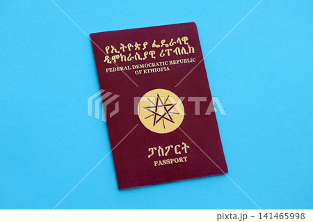 Ethiopian passport on table. Official identification document book for citizens of Ethiopia Ethiopian passport on table. Official identification document book for citizens of Ethiopia 141465998