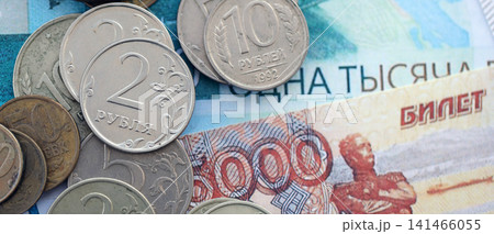 Coins and banknotes of Russian Federation ruble currency. Russia RUB money close up. Business Coins and banknotes of Russian Federation ruble currency. Russia RUB money close up. Business 141466055