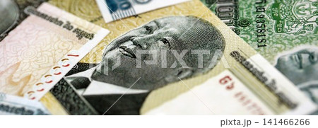 Cambodian riel money bills pile on table. Cambodia banknotes of KHR currency close up 141466266