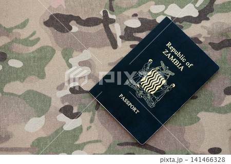 Zambian passport on table close up. Official identification document book for citizens of Zambia 141466328