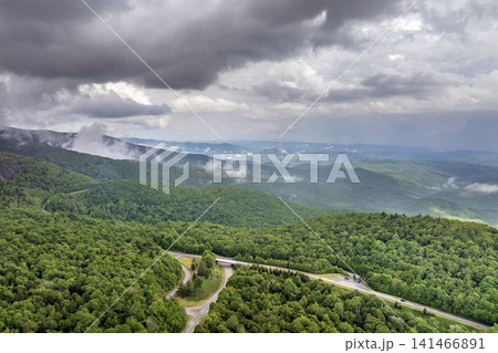 Landscape of Beacon Heights parking lot overlook on Blue Ridge Parkway in summer season. Mountain pass road in North Carolina Appalachian mountains, USA Landscape of Beacon Heights parking lot overlook on Blue Ridge Parkway in summer season. Mountain pass road in North Carolina Appalachian mountains, USA 141466891