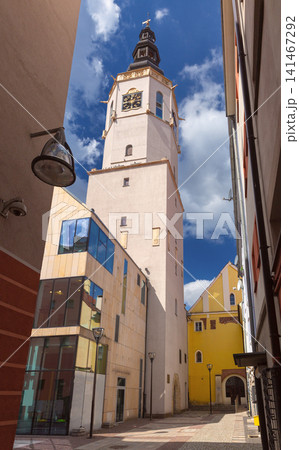 Historic Town Hall Tower in Swidnica, Lower Silesia, Poland viewed from narrow street Historic Town Hall Tower in Swidnica, Lower Silesia, Poland viewed from narrow street 141467292