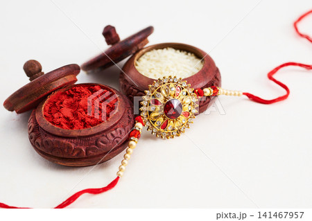 Raksha bandhan rakhi with kumkum and rice Raksha bandhan rakhi with kumkum and rice 141467957