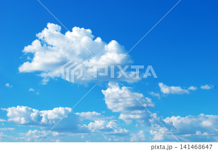 blue sky background with tiny clouds blue sky background with tiny clouds 141468647