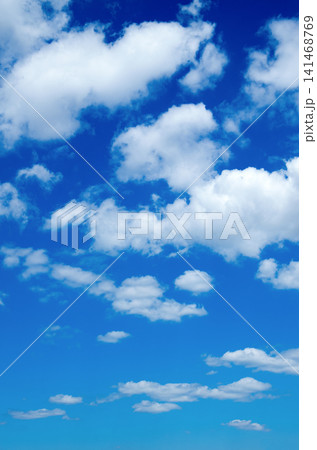 blue sky background with tiny clouds blue sky background with tiny clouds 141468769