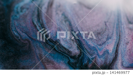 Shimmering fluid blur. Paint stream. Purple blue liquid pigment wave spill with black gray glitter mixing color abstract background. Shimmering fluid blur. Paint stream. Purple blue liquid pigment wave spill with black gray glitter mixing color abstract background. 141469977