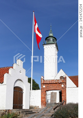 Church and lighthouse together in Tuno island, Denmark Church and lighthouse together in Tuno island, Denmark 141472254