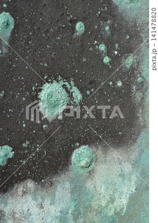 Weathered bronze texture with prominent green copper patina spots Weathered bronze texture with prominent green copper patina spots 141478820