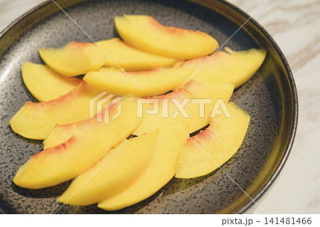 Fresh Peach Slices on a Plate Fresh Peach Slices on a Plate 141481466